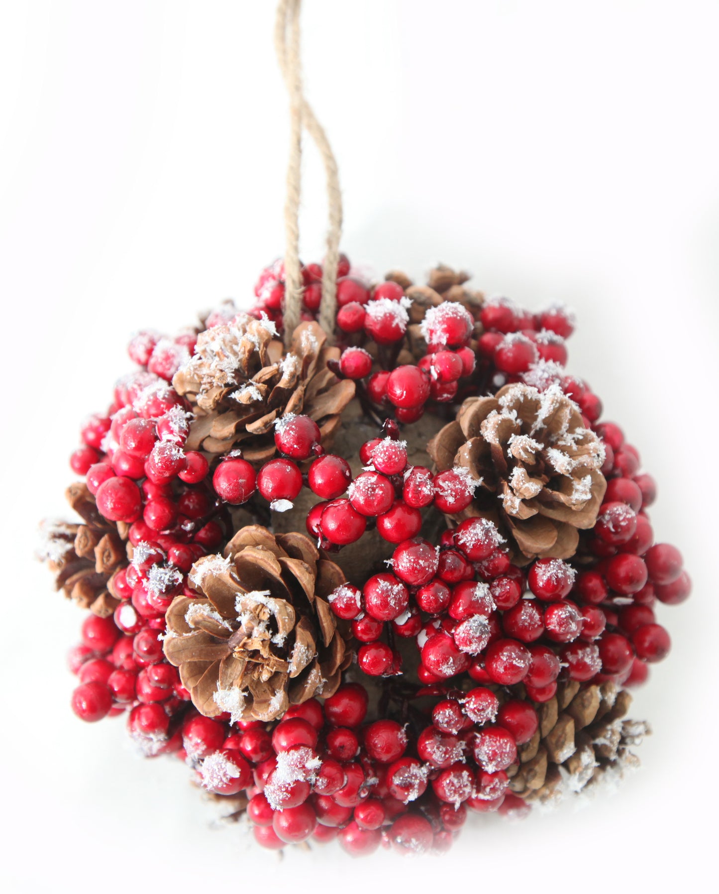 Hanging ball w/red berries and cone