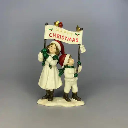 Children holding Merry Christmas sign 13cm